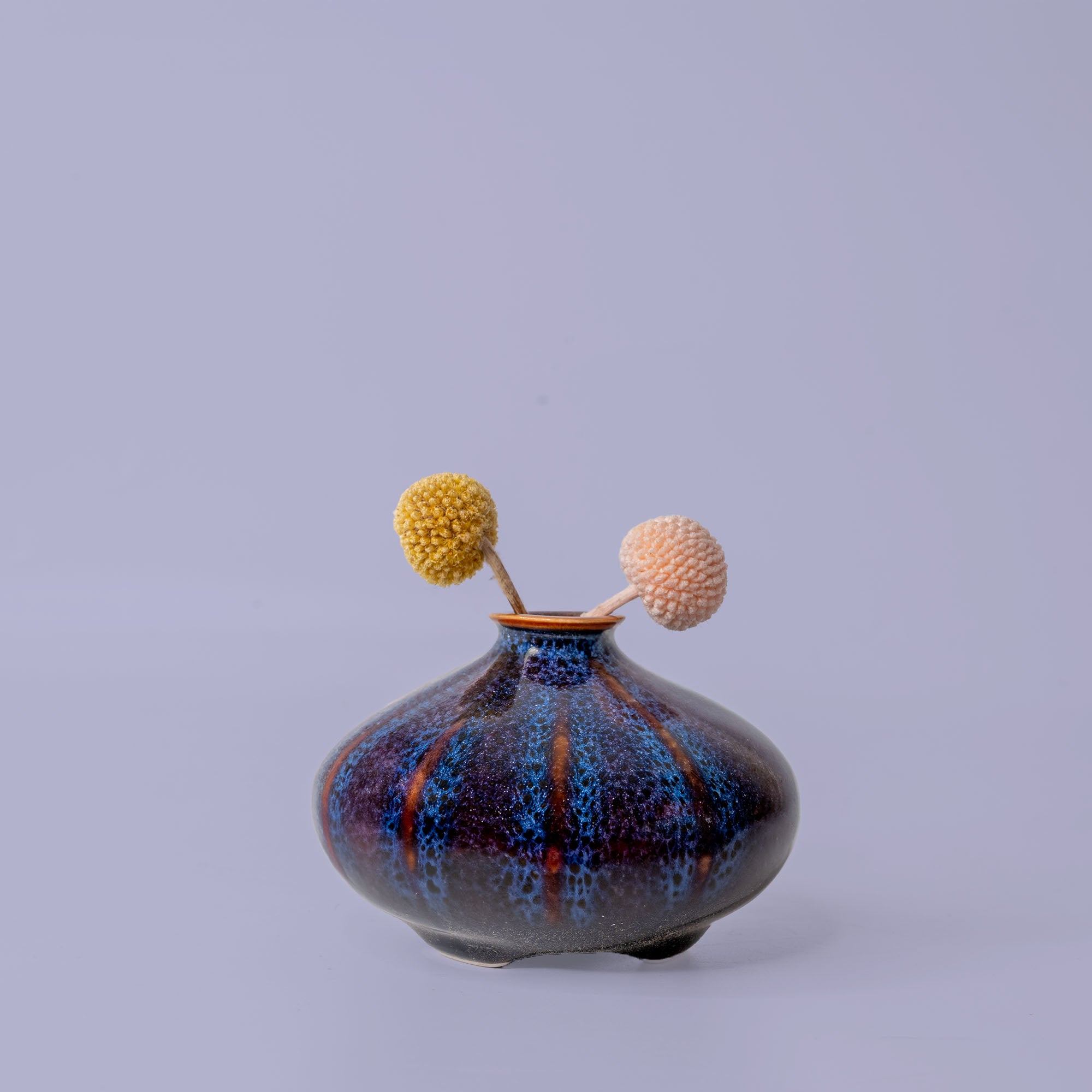 Pottery For The Planet blue ceramic artisan decorative vases with unique rounded shape and two flowers