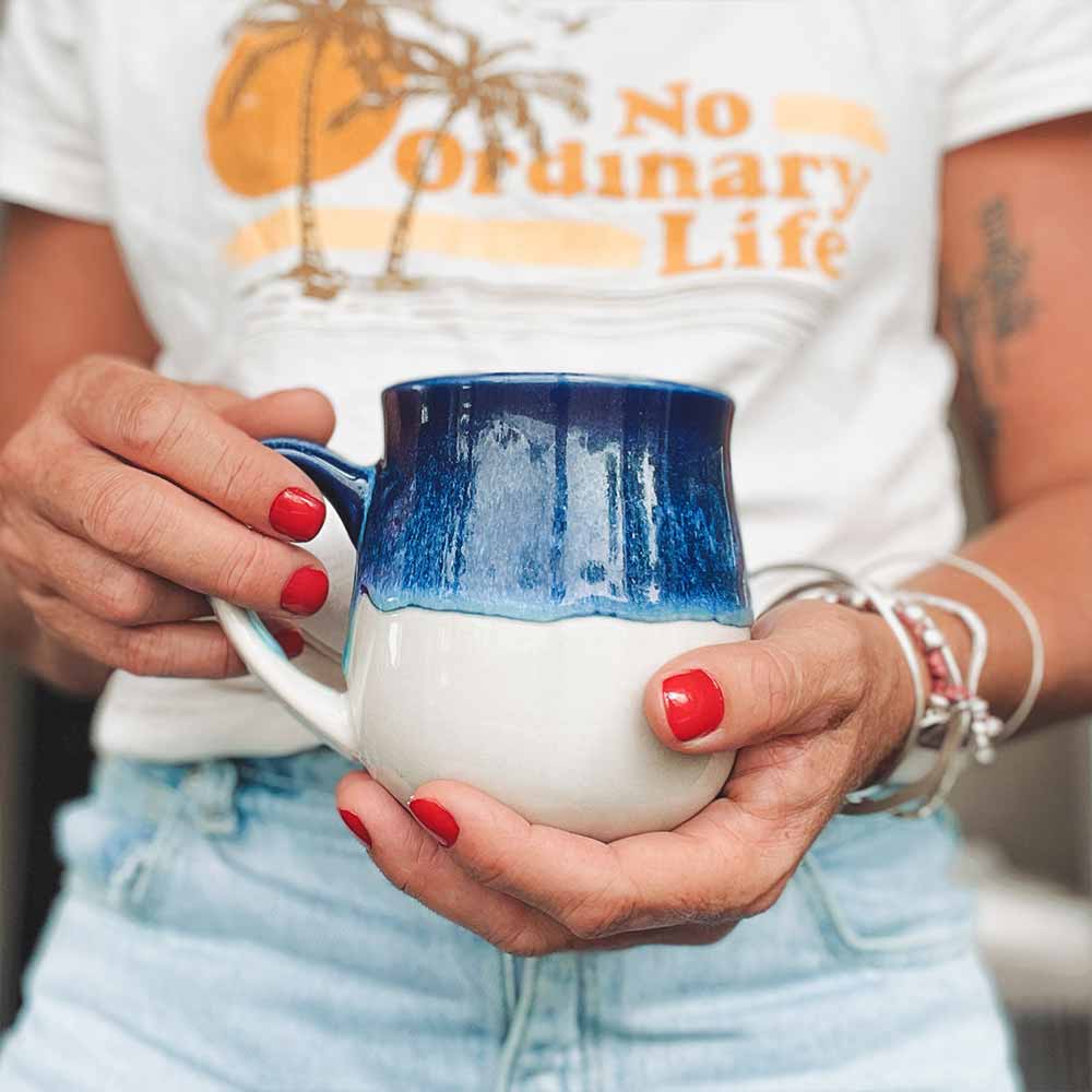 Blue and white Mug in hand