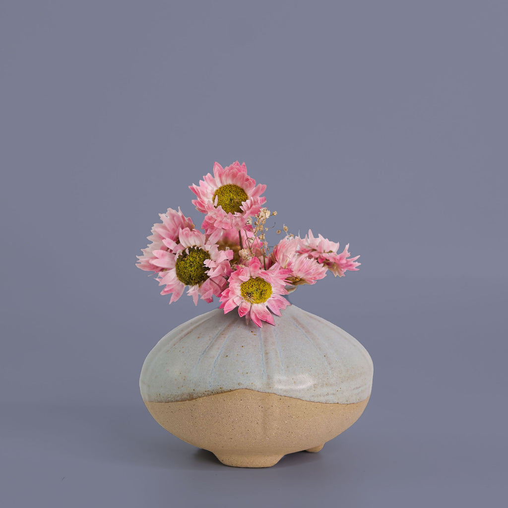 Pottery For The Planet artisan decorative vases with pink flowers in a two-tone rounded ceramic vase
