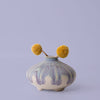 Pottery For The Planet artisan decorative vases with unique glaze and two yellow billy ball flowers