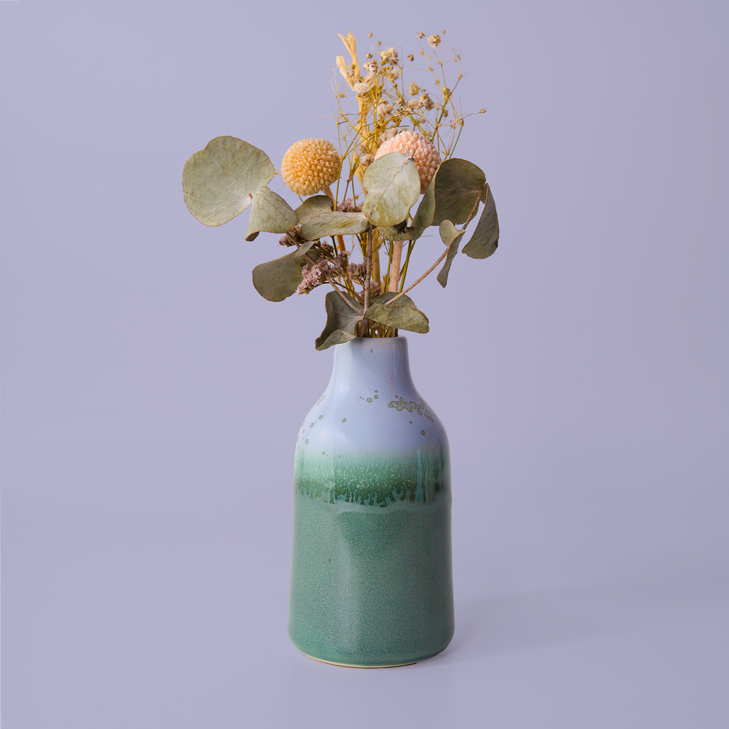 Pottery For The Planet modern decorative flower vase with green and white glaze holding dried flowers