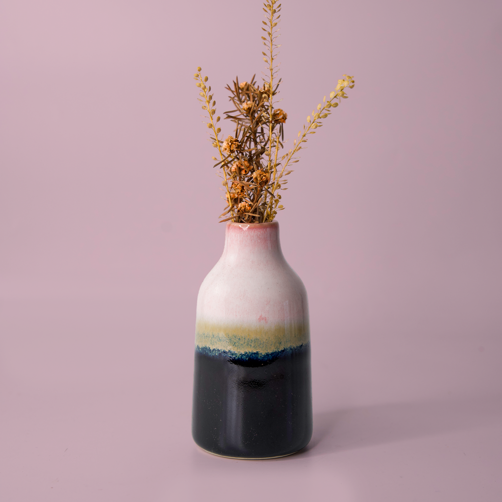 Pottery For The Planet modern decorative flower vase with pink white and blue glaze holding dried flowers