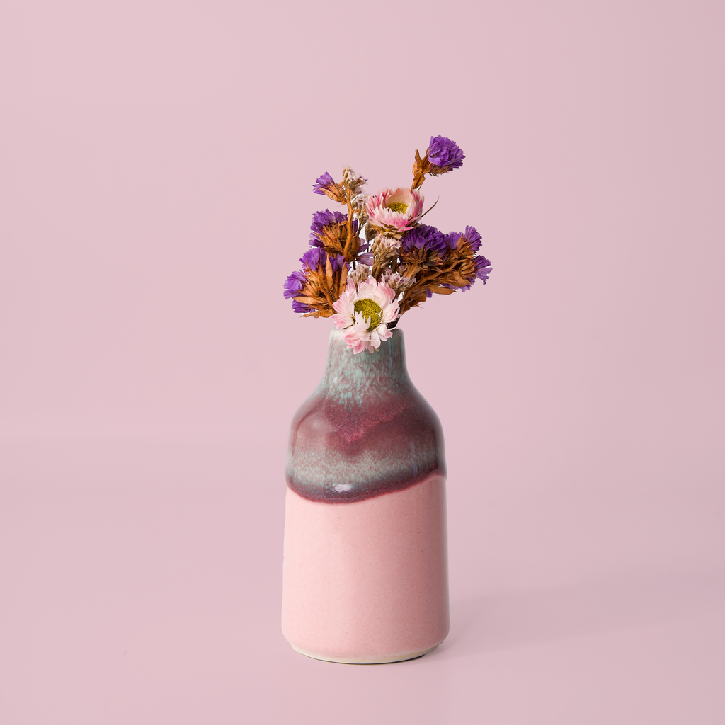 Modern decorative flower vase in pink and gray with dried purple and pink flowers by Pottery For The Planet