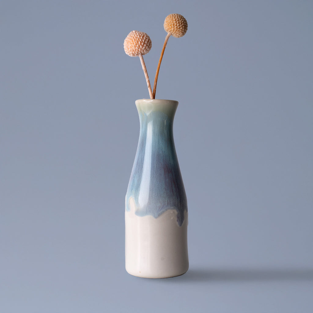 Pottery For The Planet unique ceramic flower vase with blue and white glaze holding dried flowers