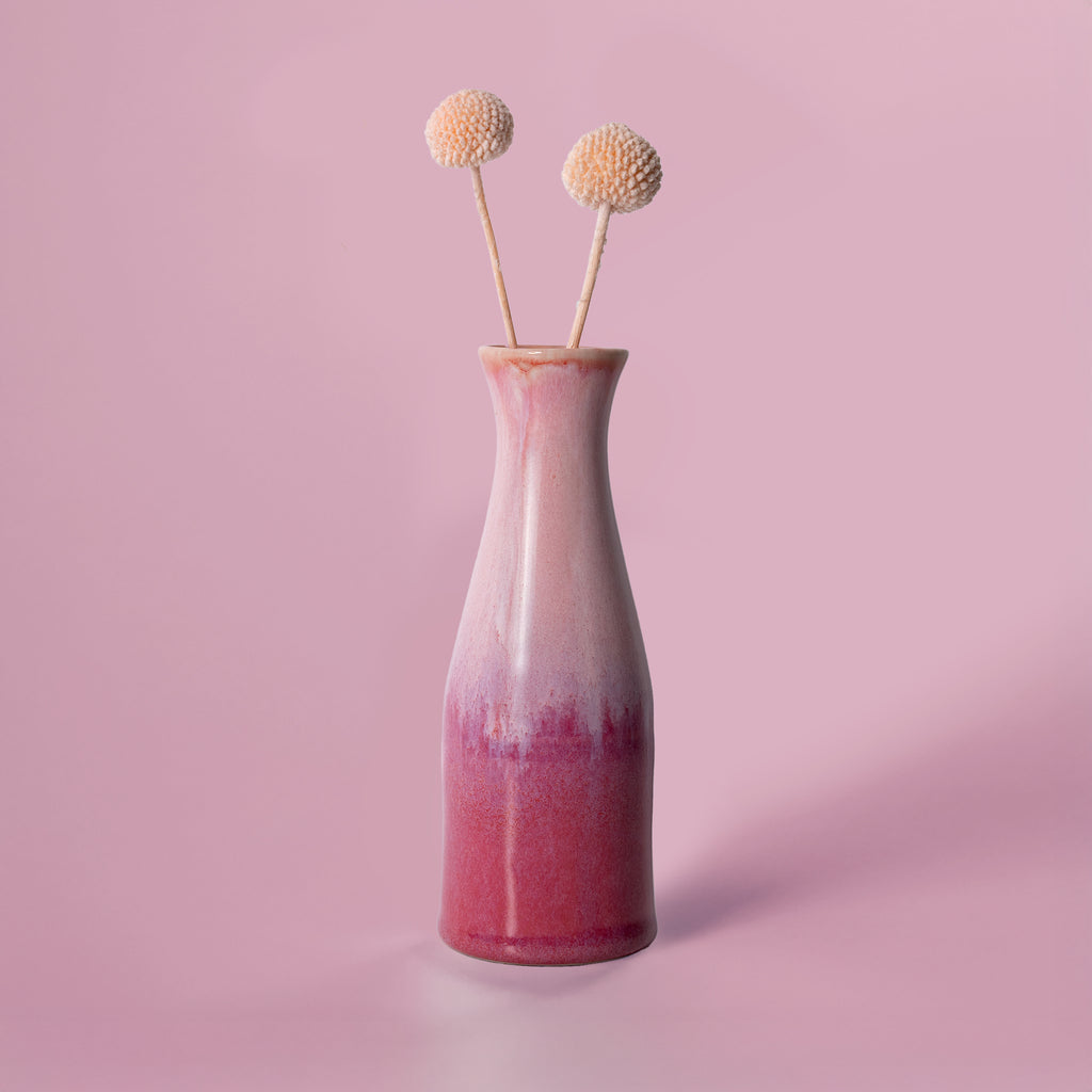 Pink glazed Pottery For The Planet unique ceramic flower vase with two dried billy ball flowers