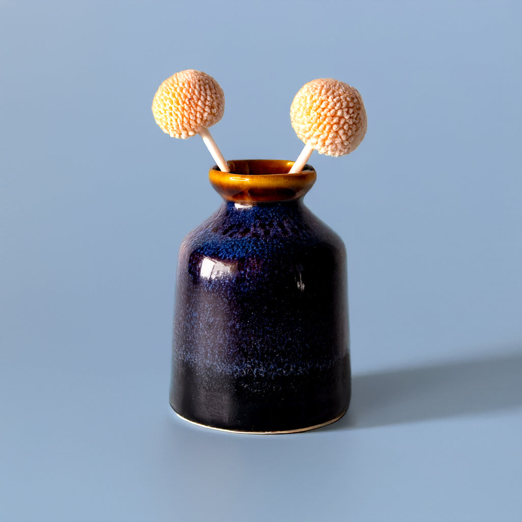 Miniature decorative vase for shelf in dark blue with brown rim from Pottery For The Planet