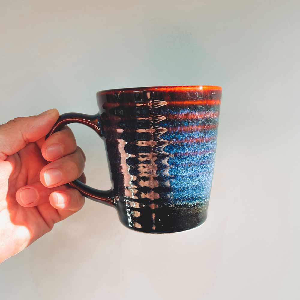 Blue Mug in Hand