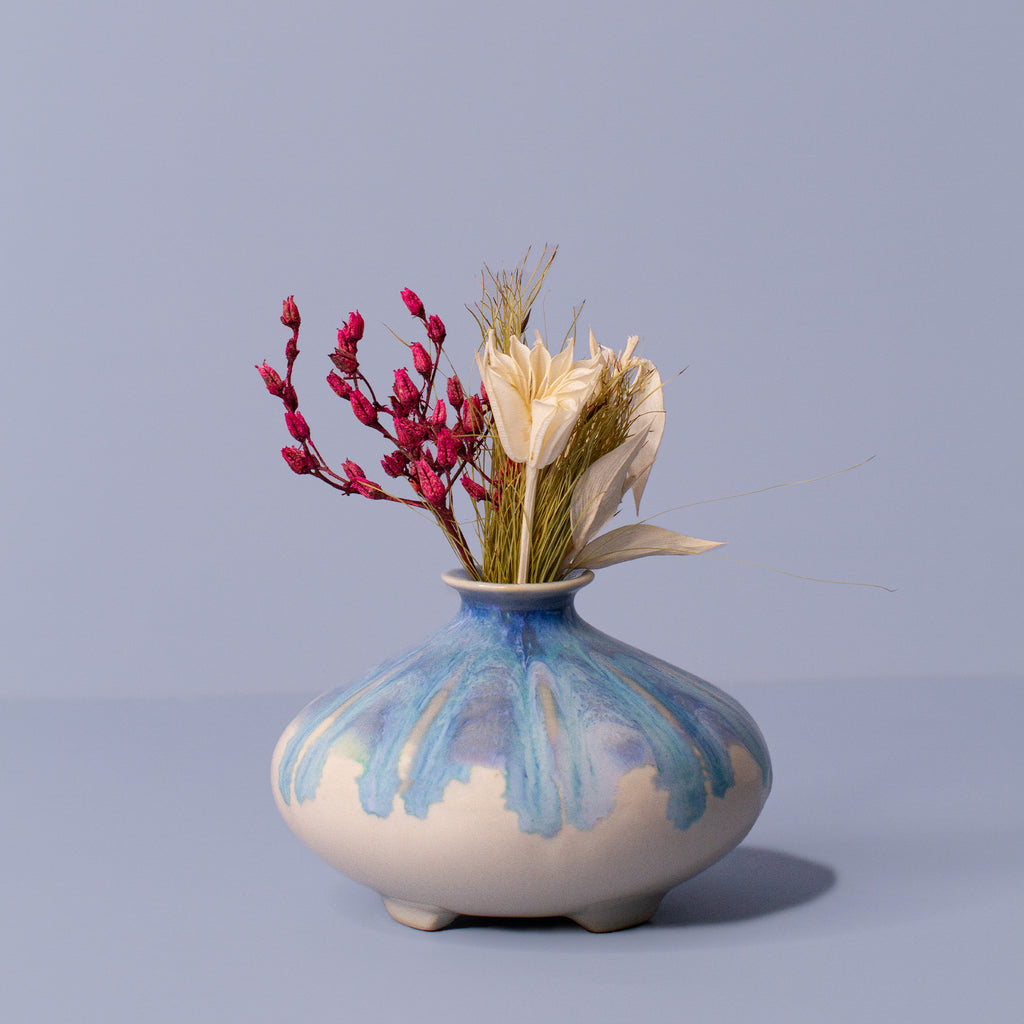 Pottery For The Planet artisan decorative vases with blue glaze and dried floral arrangement