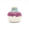 Small handmade home decor vase with textured green and purple glaze by Pottery For The Planet